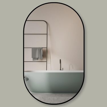 Дзеркало настінне овальне HOKO Design 45x75 см з металевим матовим каркасом. Можлива вертикальна та горизонтальна установка. Підходить для ванної кімнати, коридору, спальні та вітальні.