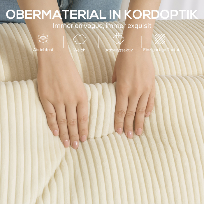 Диван на три особи, з м'якою пінопластовою структурою, широкими підлокітниками, двома подушками, обтягнутий тканиною з корду, бежевого кольору.