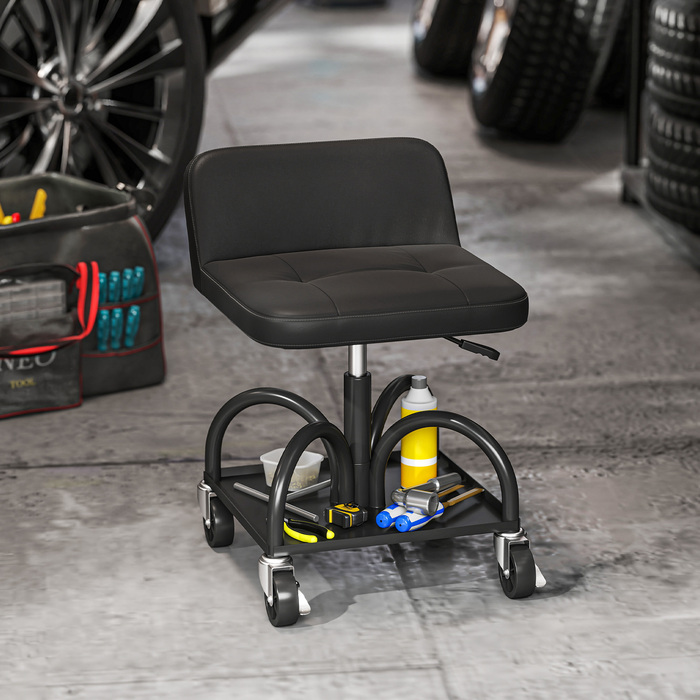 Зручний стілець-табурет для майстерні на колесах з полицею, висотою 58,5 см, здатний витримувати навантаження до 135 кг, чорного кольору.