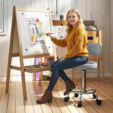 Регульований поворотний пуф з підніжкою та спинкою, обтягнутий штучною шкірою, сірого кольору. Ідеально підходить для перукарських салонів.