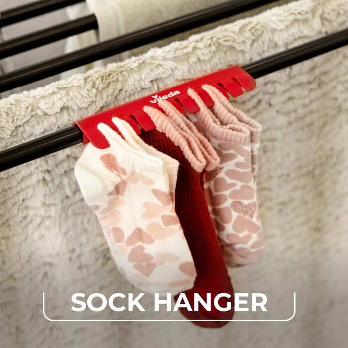 Сушарка для білизни Vileda Infinity Flex Ultimate Black Edition з розсувним телескопічним каркасом, XXL-стійками, чорного кольору. Складається та поставляється у зібраному вигляді. Ідеальна для великої кількості білизни. Екологічна упаковка.