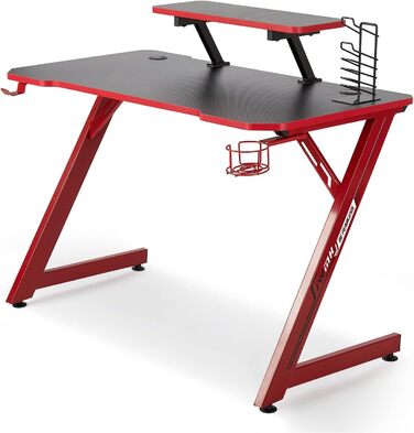 Ігровий стіл Intimate WM Heart 110 см: ергономічний стіл з карбоновою поверхнею, тримач для навушників, підставки для напоїв та аксесуарів, чорно-червоний