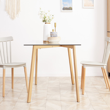 Обідній стіл на 4 особи, зі скляною стільницею, сталевим каркасом та імітацією дерев'яної текстури, розміром 120 см (довжина) x 60 см (ширина) x 76 см (висота)