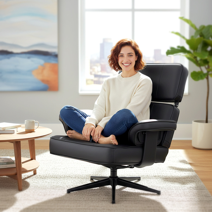 Регульоване крісло для відпочинку з відкидною підніжкою, обтягнуте штучною шкірою, з регульованою підголівником, металевим каркасом, чорного кольору.