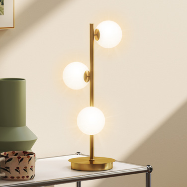 Настільна лампа з трьома сферичними плафонами, міцний сталевий постамент, патрони G9, розміри 24 x 24 x 53 см, латунь.