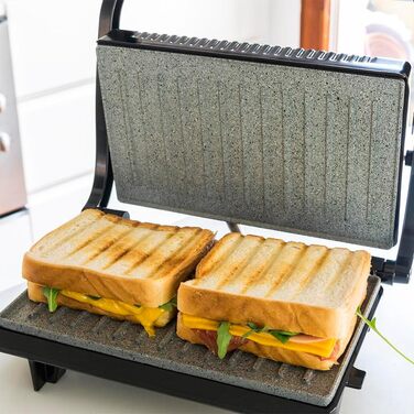 Електрогриль Cecotec Rock'nGrill 700W з антипригарним покриттям, 23x14.5 см, без PTFE та PFOA, плаваюча платформа, холодний ручка, індикатор, вертикальне зберігання