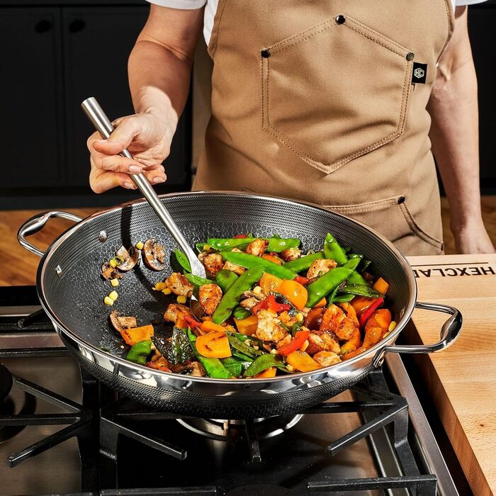 HexClad вок 35 см з нержавіючої сталі з антипригарним покриттям, ручка Stay Cool, сумісний з усіма типами плит, PFOA free, можна мити в посудомийній машині та використовувати в духовці