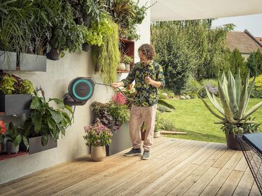 Шланг садовий Gardena RollUp M (бірюзовий) 20м: гнучкий, з поворотним барабаном, з кріпленням для стіни, з розпилювачем та 20м шлангу