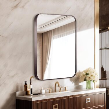 Дзеркало для ванної кімнати на стіну з округлим прямокутним дизайном та коричневим металевим каркасом. Підходить для ванної, передпокою, вітальні, спальні. Вертикальна або горизонтальна орієнтація. Розміри: 91.4 x 61 см, колір: брашований титан.