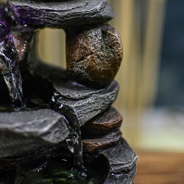 Джерело води Zen'Light від Zimmerbrunnen: природний водоспад з ефектом каменів та кольоровим LED-підсвічуванням. Ідеальна декор для дому, медитації та релаксації. Об'єкт Фен-Шуй для щастя. Висота 23 см (Satya)