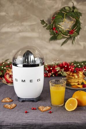 Соковижималка для цитрусових SMEG CJF11RDEU, електрична, 70 Вт, нержавіюча сталь, біла, антикрапельний носик, універсальний конус, фільтр, нековзні ніжки