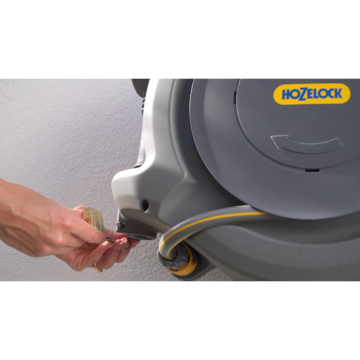 HOZELOCK Автоматичний шланг на котушці Auto Reel 40 м: автоматичне змотування, проста установка. В комплекті: шланг-розпилювач, з'єднувачі, 40 м шланга Hozelock та кріплення. 5 років гарантії [2595R0000] (45 x 49 x 28.4 см)