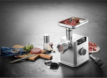Електрична м’ясорубка WMF Profi Plus 2200Вт з насадками для ковбас, кеббе та печива, 3 диски, реверс
