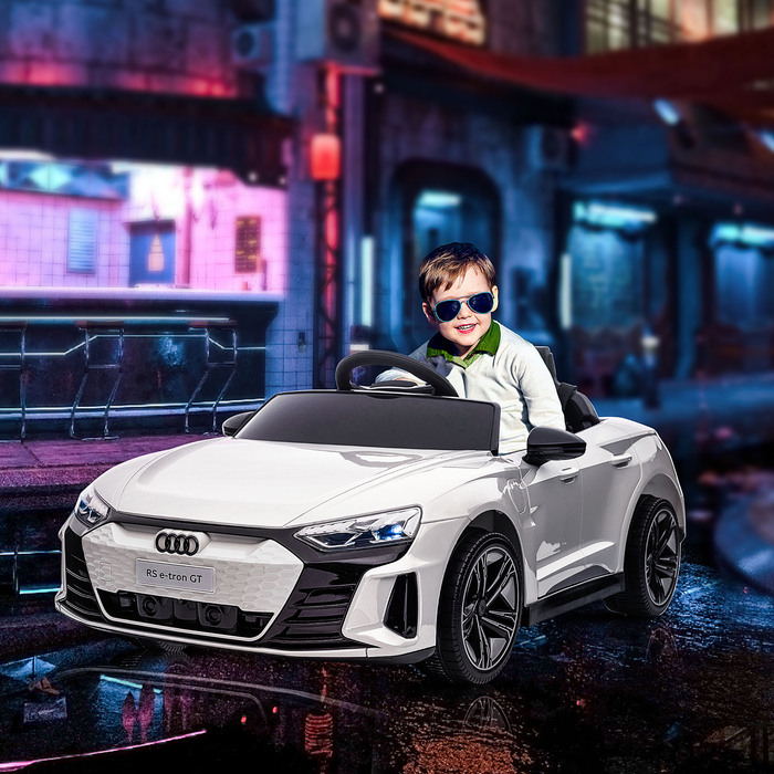 Дитячий електромобіль Audi RS e-tron GT з ременем безпеки, пультом дистанційного керування, фарами, музичною функцією, білий колір, розміри 103 x 58 x 41 см