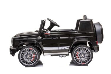 Дитячий електромобіль Mercedes G63 з шкіряним сидінням та пультом керування