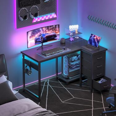 Кутовий письмовий стіл Coleshome L-подібний (100x70 см) з 4 шухлядами, реверсивний комп'ютерний стіл для офісу та спальні, чорний