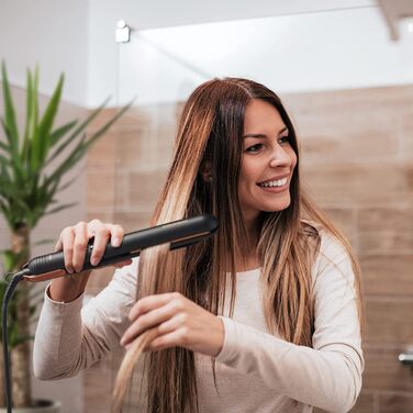 Випрямляч для волосся GRUNDIG Naturashine HS 7030, іонний, керамічний, 6 режимів, 130–230°C, захист волосся, чорний/рожеве золото