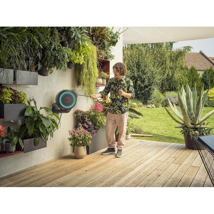 Шланг садовий Gardena RollUp M (бірюзовий) 20м: гнучкий, з поворотним барабаном, з кріпленням для стіни, з розпилювачем та 20м шлангу