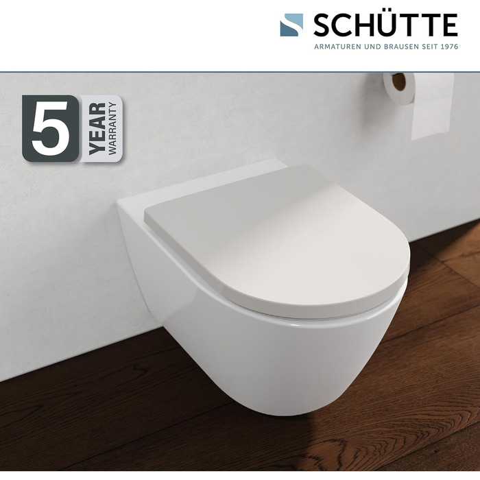 Сидіння для унітаза SCHÜTTE з мікроліфтом (D-подібне), біле, з ударостійкого дуропласту, витримує до 200 кг, з клейкими подушками для монтажу