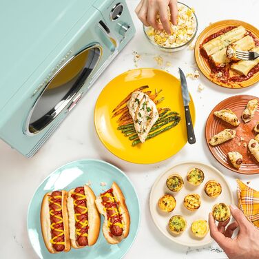 Мікрохвильова піч Nostalgia Retro для кухні 800 Вт, 25 літрів, аква, 12 програм, цифровий годинник
