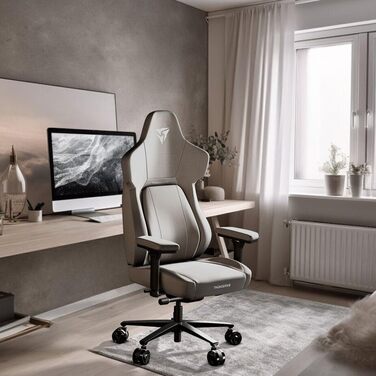 Ігрове крісло ThunderX3 CORE Loft, ергономічне, тканинне, світло-сіре, з підставкою для ніг, підтримкою попереку та меморі-подушкою